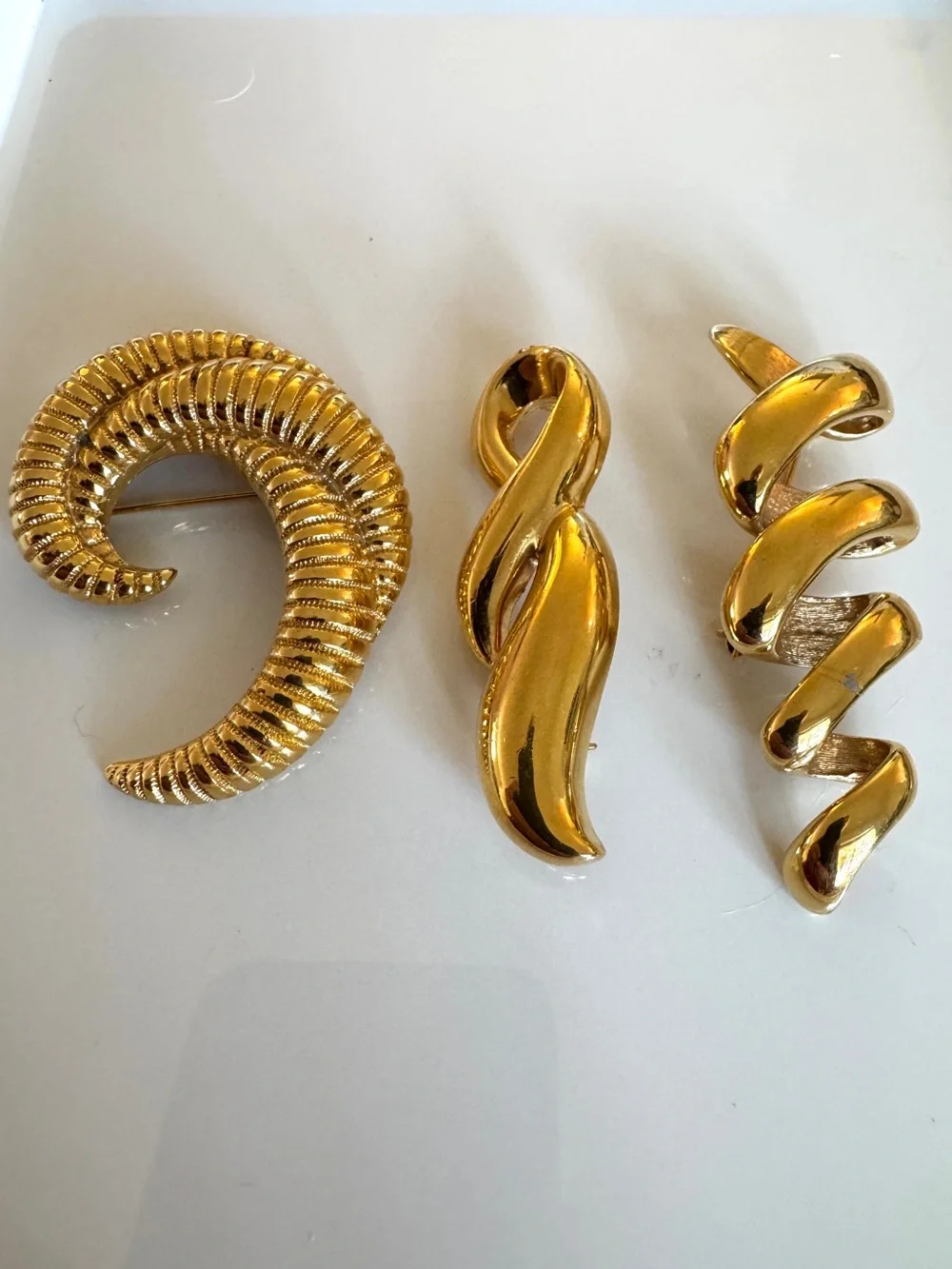 Monet Gold-Tone Spiral Brooch Trio - Sculptural Swirl Designs